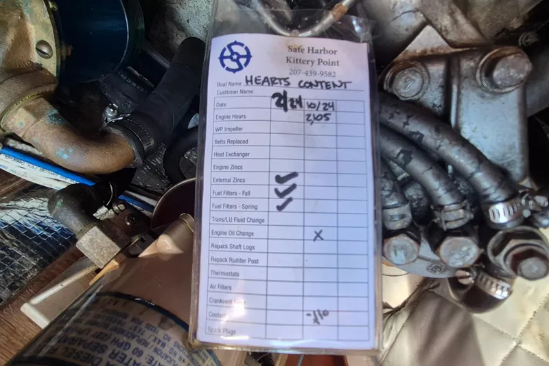 Slide: The Image of Maintenance checklist on a 1999 Robinhood Cutter engine, showing completed tasks and dates. - 48
