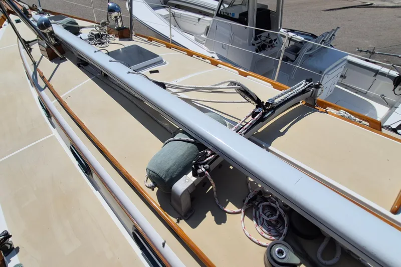 Slide: The Image of Deck of 1999 Robinhood Cutter sailboat with rigging and equipment. - 37