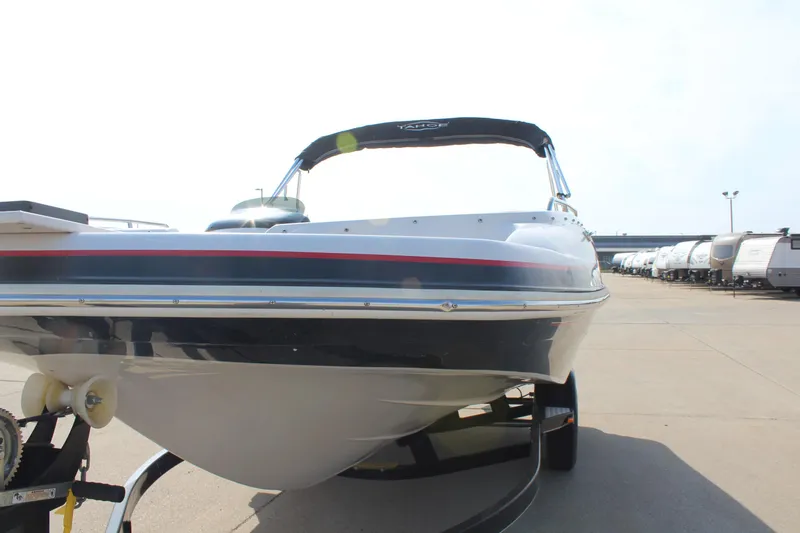 Slide: The Image of 2015 Tahoe 215 I/O boat on trailer in parking lot. - 11