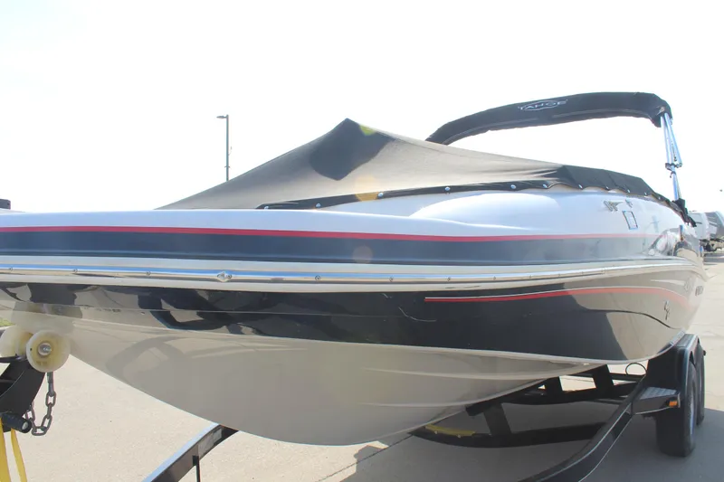 Slide: The Image of 2015 Tahoe 215 I/O boat on trailer with cover, side view. - 4