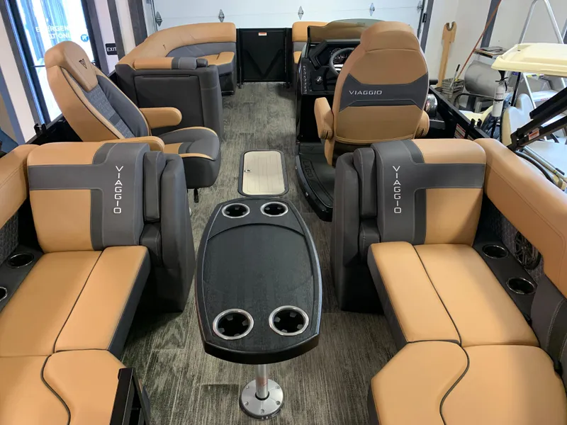 Slide: The Image of Luxurious 2025 Viaggio Lago Z22U boat interior with tan and gray seating, modern design. - 7