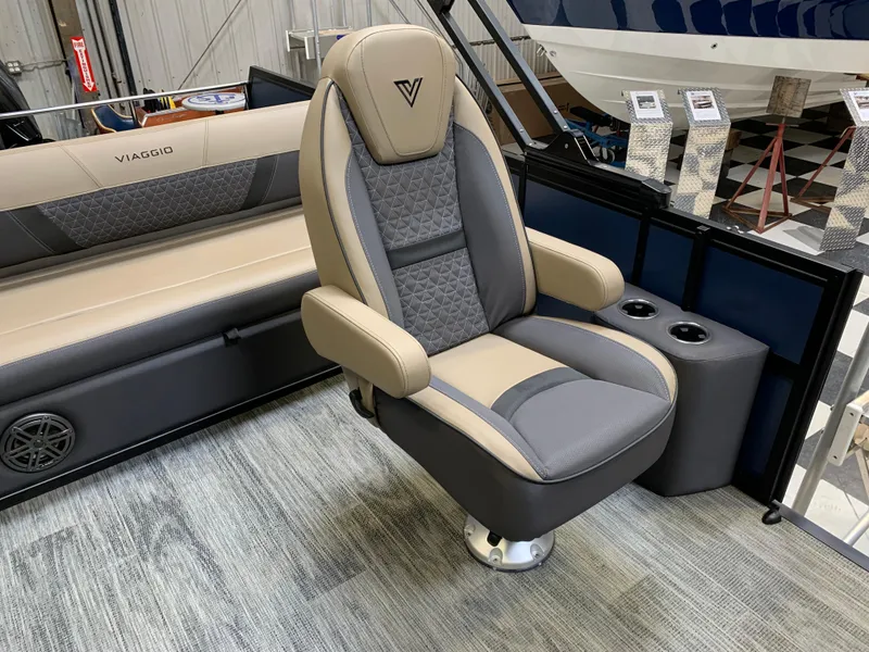 Slide: The Image of Luxurious Viaggio Lago Z 24 S boat seat, 2025 model, featuring elegant beige and gray upholstery. - 3