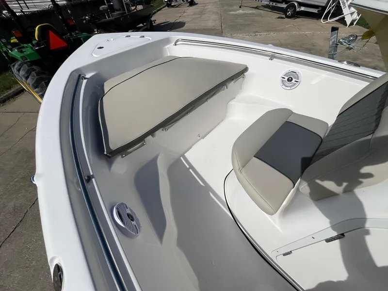 Slide: The Image of 2025 Key West 189 FS boat interior with cushioned seating and speakers. - 13