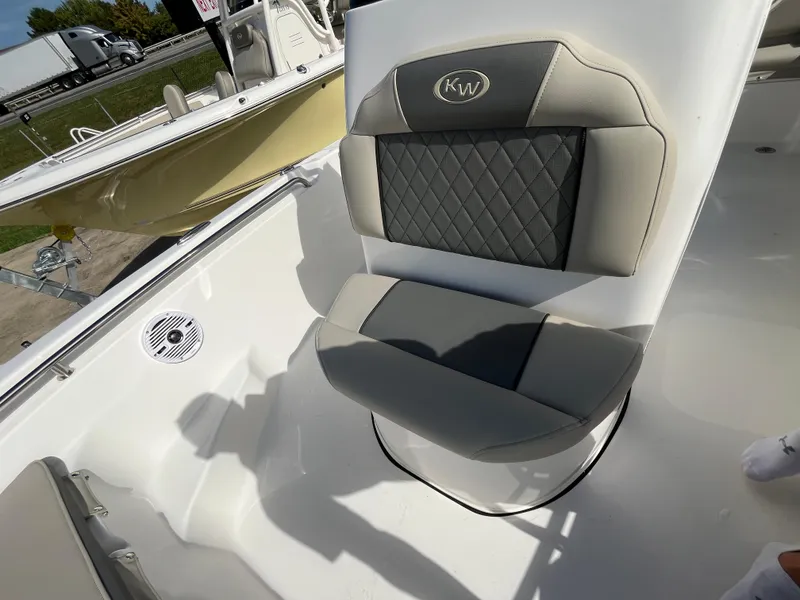 Slide: The Image of 2025 Key West 189 FS boat seat with quilted design and logo. - 14