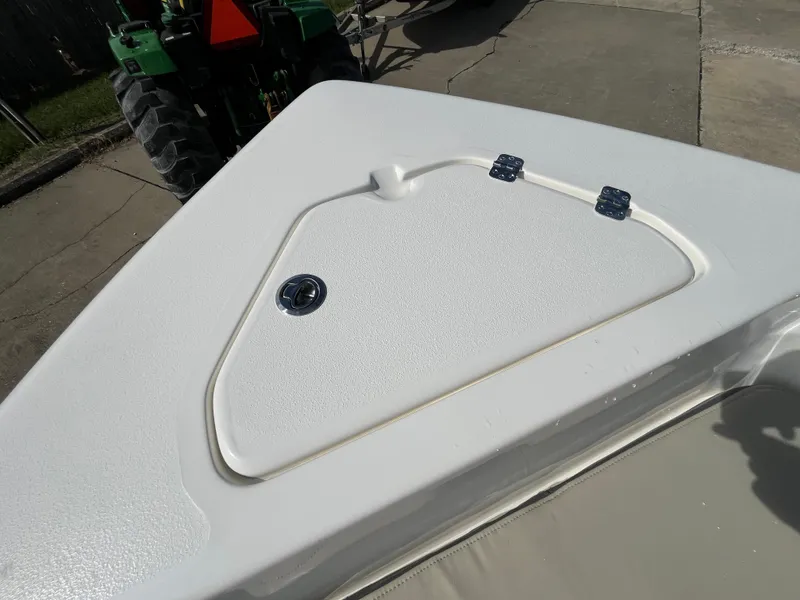 Slide: The Image of 2025 Key West 189 FS boat deck with storage compartment. - 17