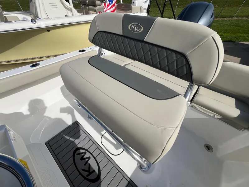 Slide: The Image of 2025 Key West 189 FS boat seat with logo, featuring cushioned design and sleek finish. - 8