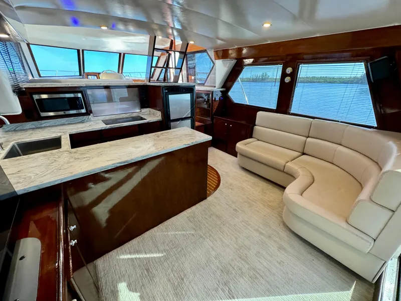 Slide: The Image of Luxurious 1998 Navigator Pilothouse interior with modern kitchen and comfortable seating. - 18