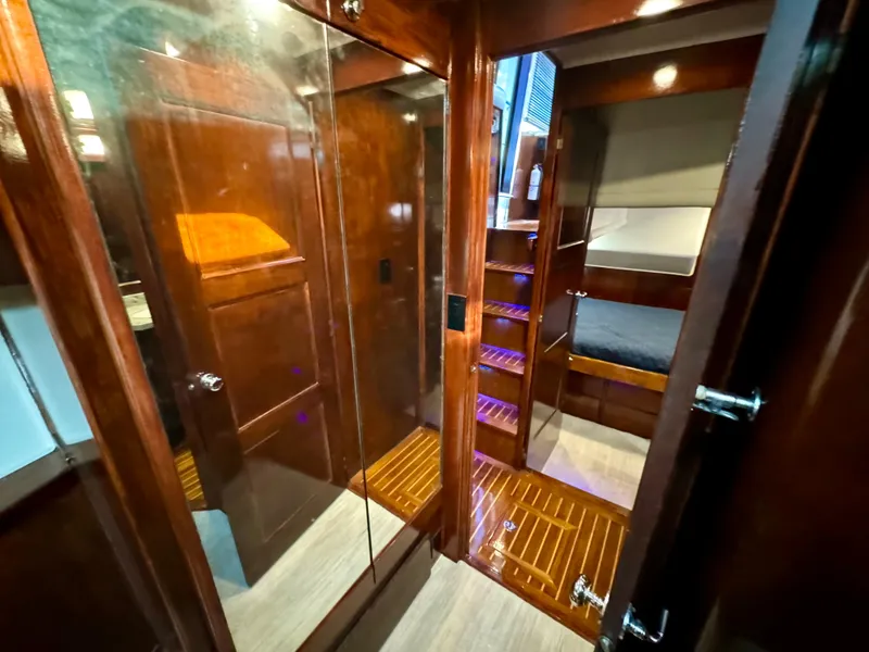 Slide: The Image of Luxurious 1998 Navigator Pilothouse interior with wooden finishes and cozy cabin space. - 46