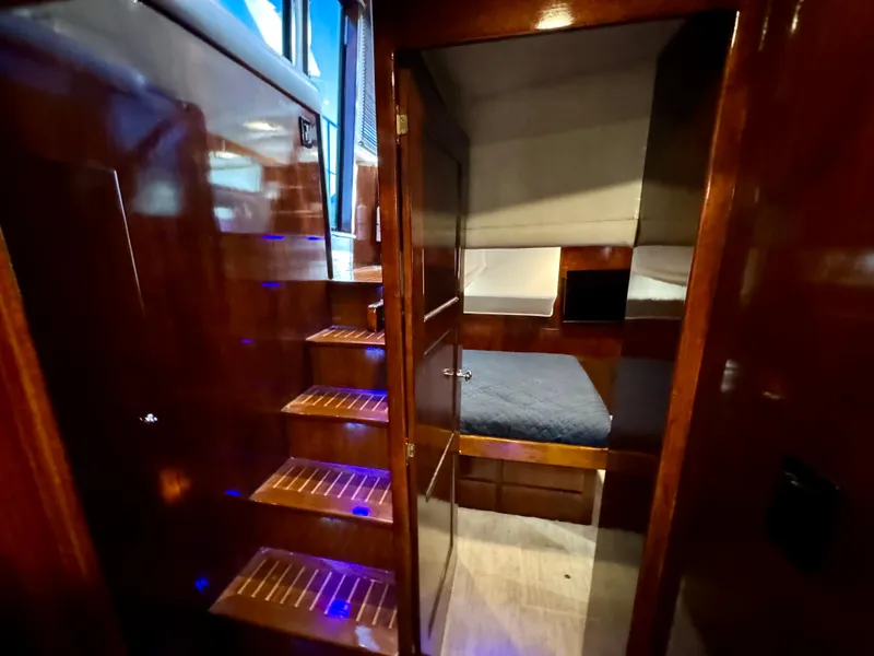 Slide: The Image of Luxurious 1998 Navigator Pilothouse interior with wooden stairs and cozy cabin. - 47
