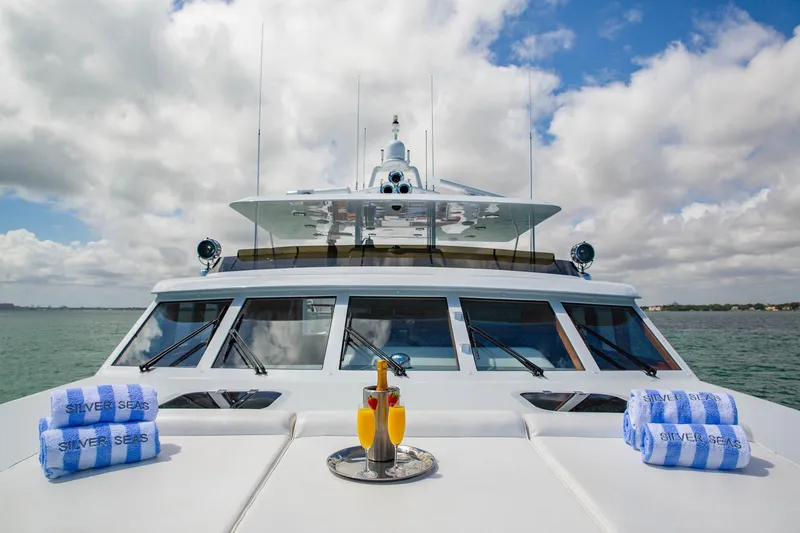 Slide: The Image of Luxury yacht deck with drinks and towels, 1998 Burger Raised Pilothouse. - 13