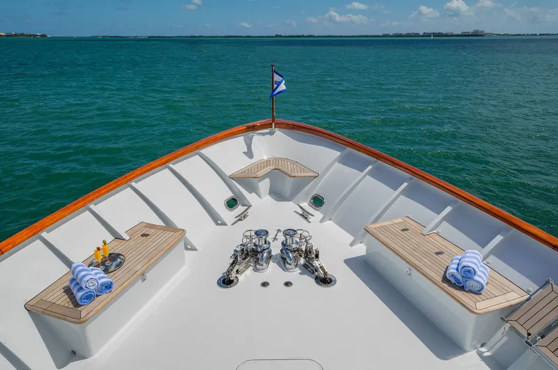 Slide: The Image of Bow of 1998 Burger Raised Pilothouse yacht with ocean view and deck seating. - 14