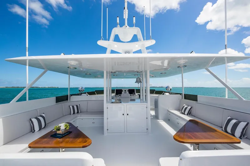 Slide: The Image of Luxurious 1998 Burger Raised Pilothouse yacht deck with seating and ocean view. - 17