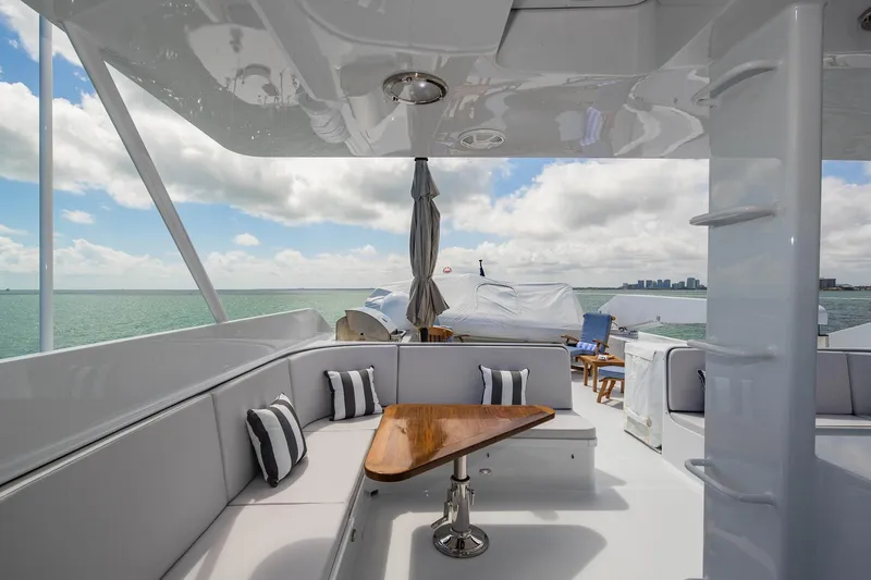 Slide: The Image of Luxurious 1998 Burger Raised Pilothouse yacht deck with seating and ocean view. - 18