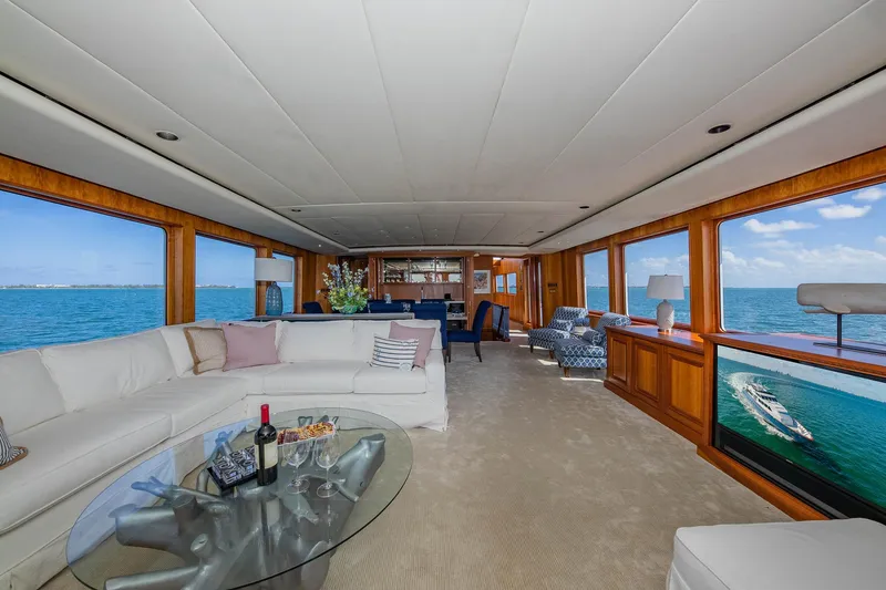 Slide: The Image of Luxurious 1998 Burger Raised Pilothouse yacht interior with ocean views and elegant furnishings. - 26
