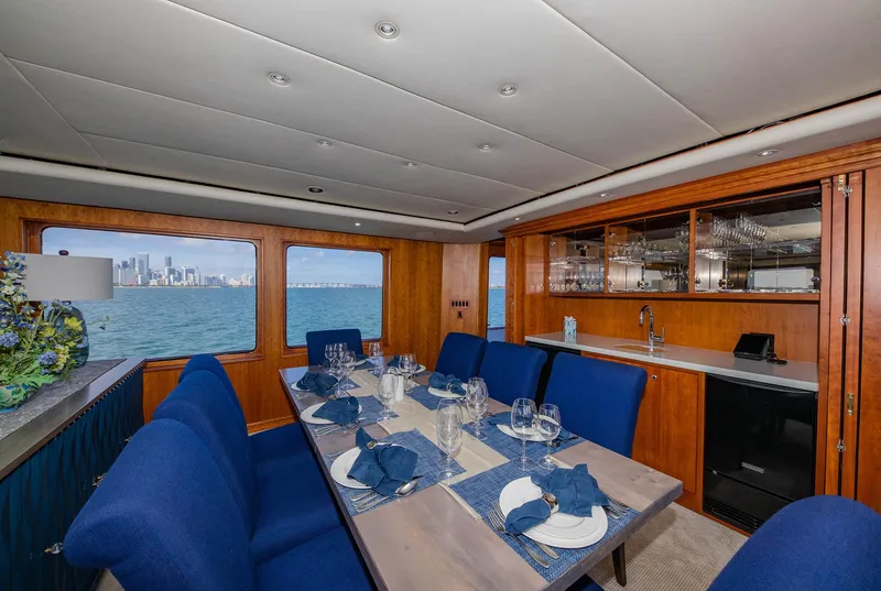 Slide: The Image of Luxurious dining area on 1998 Burger Raised Pilothouse yacht with ocean view. - 28
