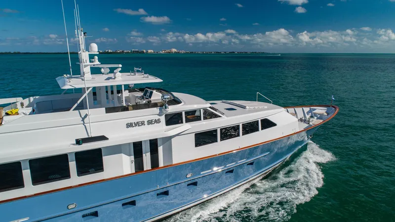 Slide: The Image of Luxurious 1998 Burger Raised Pilothouse yacht cruising on open water. - 3