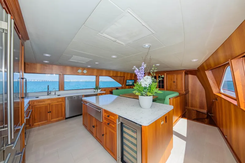 Slide: The Image of Luxurious 1998 Burger Raised Pilothouse yacht interior with modern kitchen and ocean view. - 37