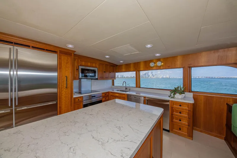 Slide: The Image of Luxurious kitchen interior on 1998 Burger Raised Pilothouse yacht with ocean view. - 38