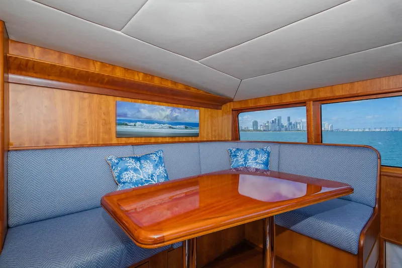 Slide: The Image of Luxurious 1998 Burger Raised Pilothouse yacht interior with elegant wood dining area and ocean view. - 42
