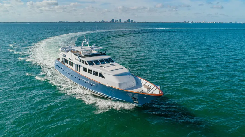 Slide: The Image of Luxurious 1998 Burger Raised Pilothouse yacht cruising on open water. - 5