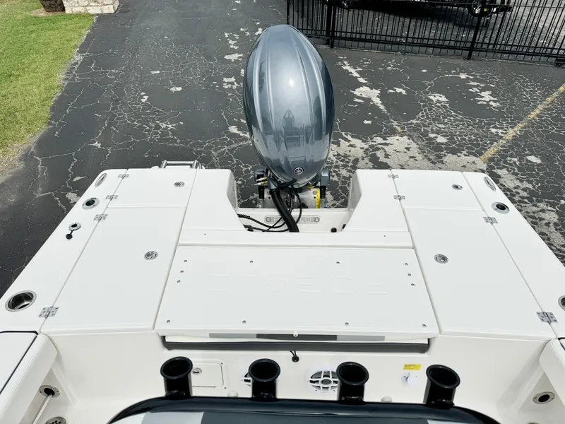 Slide: The Image of 2024 Robalo 226 Cayman boat with outboard motor, rear deck view. - 26