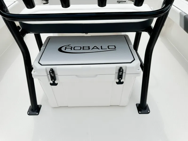 Slide: The Image of 2024 Robalo 226 Cayman boat cooler under seat, black frame. - 34