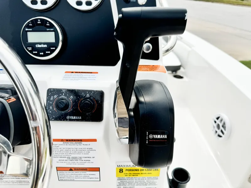 Slide: The Image of Close-up of 2024 Robalo 226 Cayman boat controls with Yamaha throttle. - 44