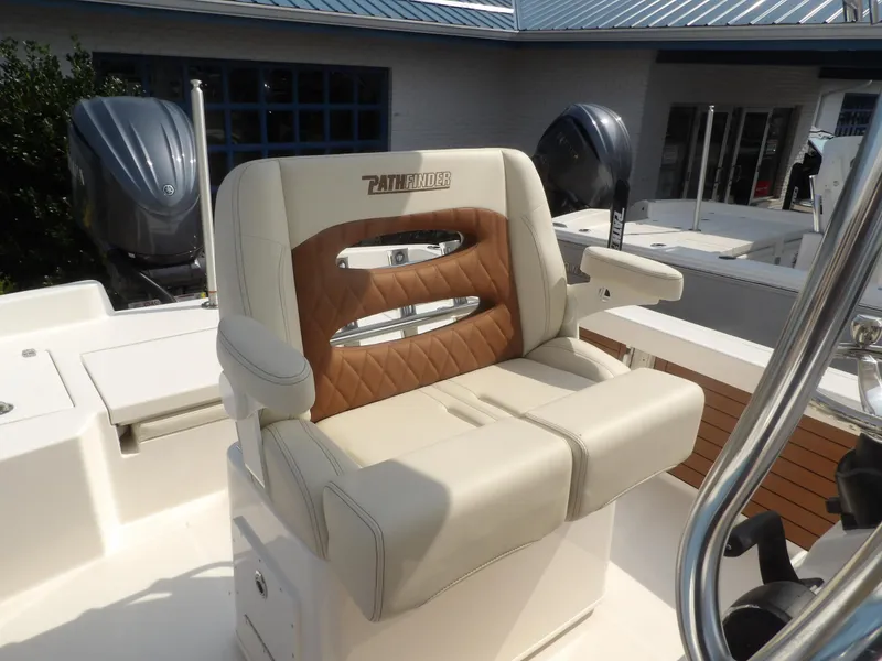 Slide: The Image of 2024 Pathfinder 2400 TRS boat seat with brown and cream upholstery. - 5