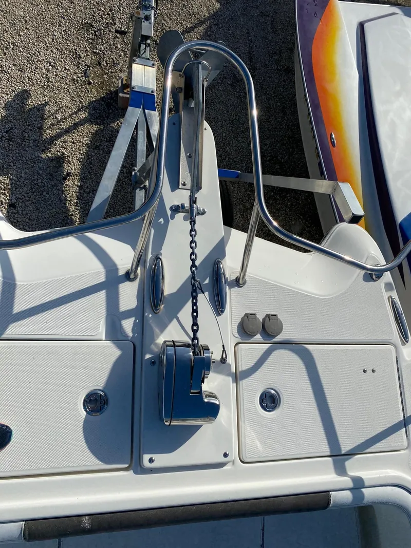 Slide: The Image of 2018 World Cat 255 DC boat deck with anchor chain and railing. - 15