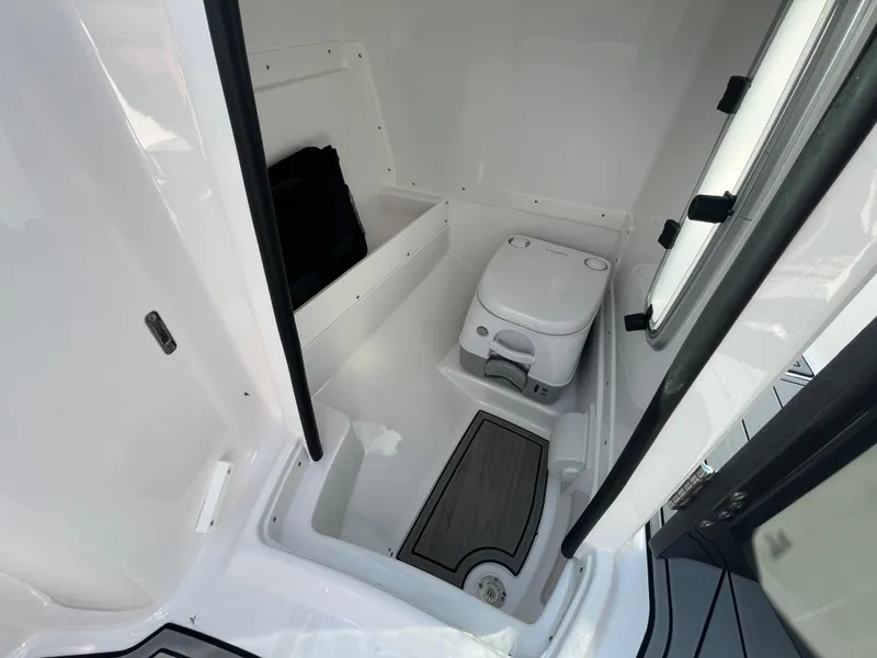 Slide: The Image of Compact bathroom in 2025 Monterey M-45 boat with modern amenities. - 14