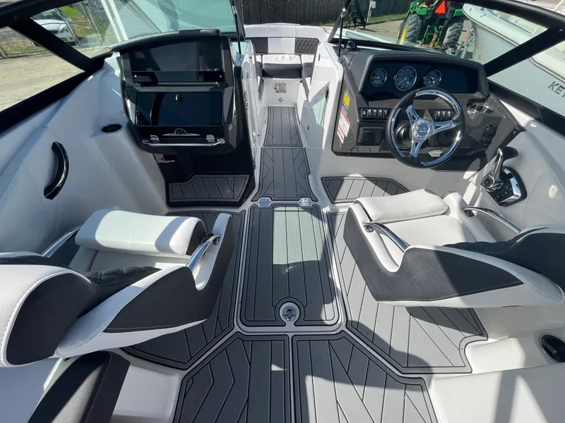 Slide: The Image of 2025 Monterey M-45 boat interior with modern dashboard and seating. - 18