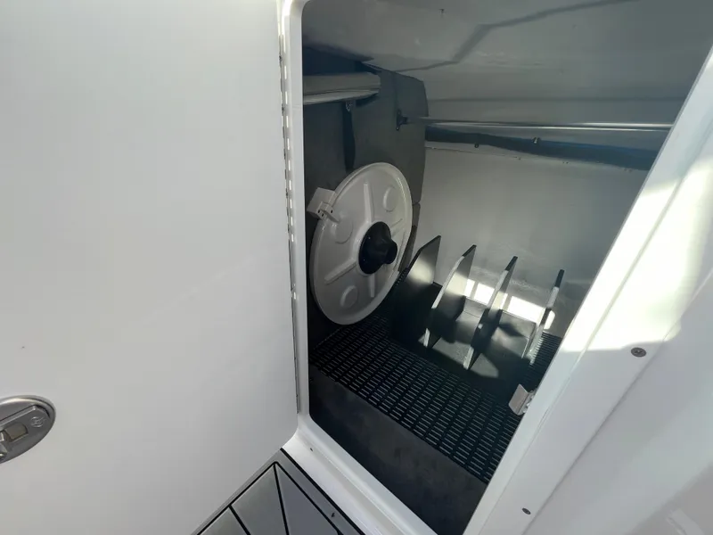 Slide: The Image of 2025 Monterey M-45 storage compartment with organized interior and secure hatch. - 21