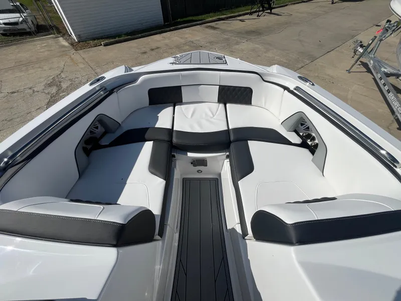 Slide: The Image of 2025 Monterey M-45 boat interior with white and black seating. - 23