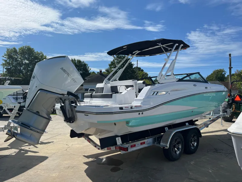 Slide: The Image of 2025 Monterey M-45 boat on trailer, featuring sleek design and powerful outboard motor. - 4