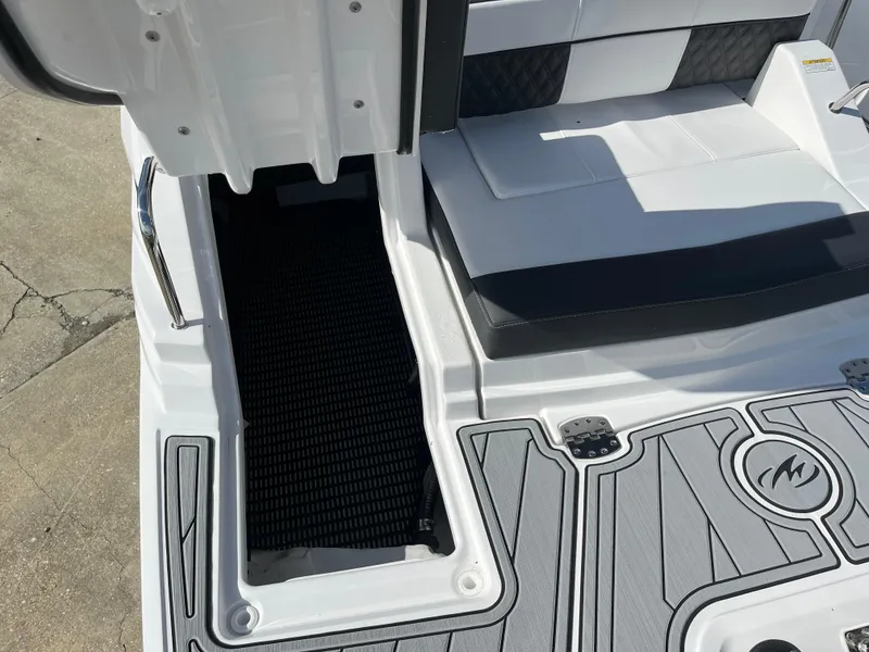 Slide: The Image of 2025 Monterey M-45 boat interior with sleek seating and modern flooring design. - 7