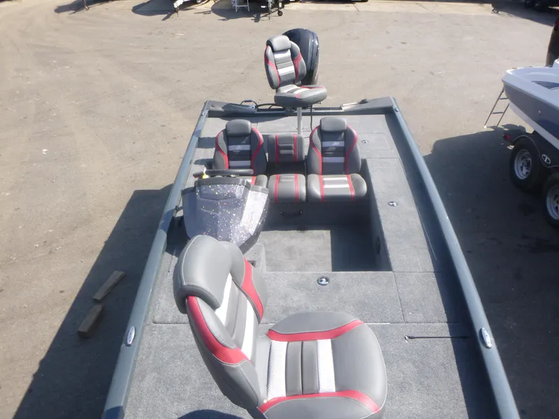 Slide: The Image of 2024 Ranger RT188C fishing boat interior with gray and red seating. - 18