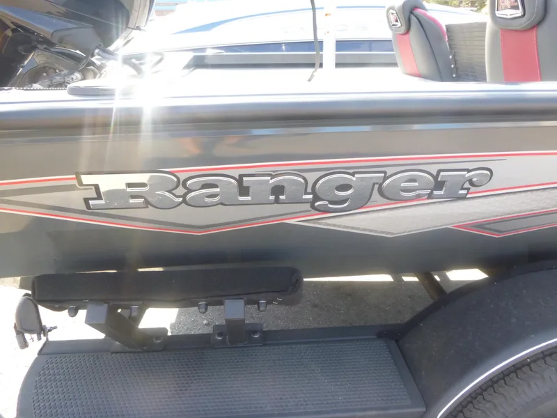 Slide: The Image of 2024 Ranger RT188C boat with logo and seating detail. - 2