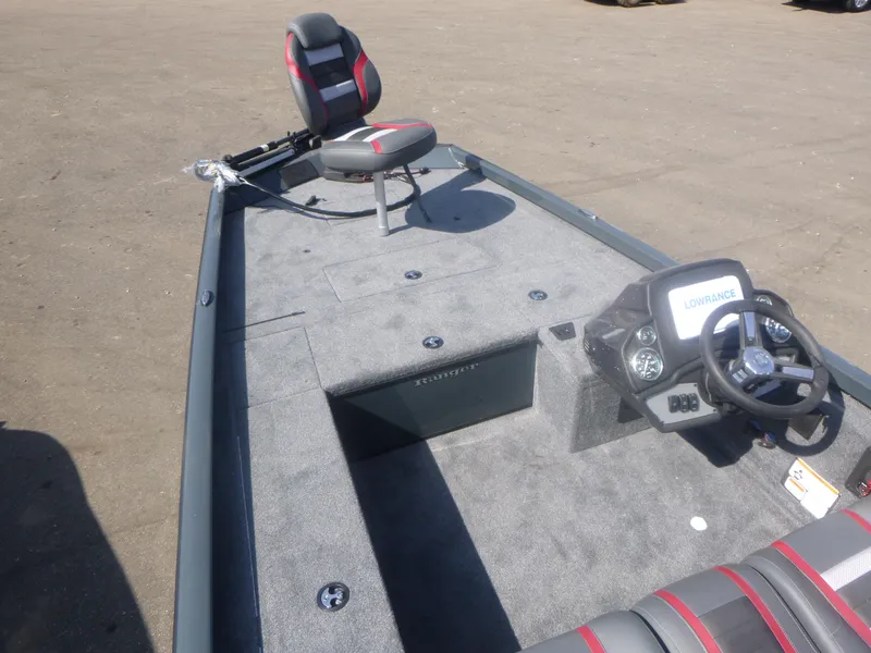 Slide: The Image of 2024 Ranger RT188C fishing boat interior with steering console and seating. - 20