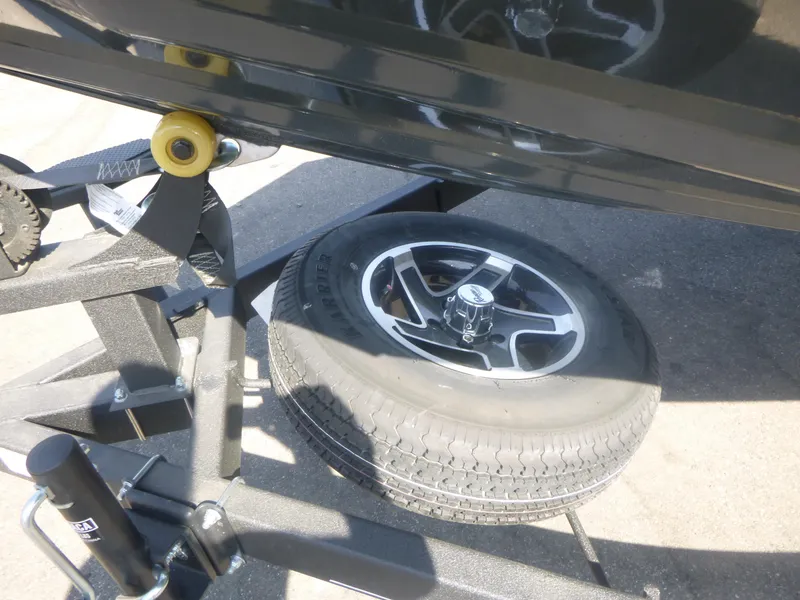 Slide: The Image of 2024 Ranger RT188C trailer with spare tire and wheel detail. - 7