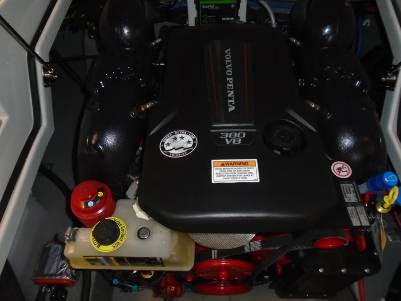 Slide: The Image of Volvo Penta 380 V8 engine in 2024 Crownline E 235 Surf boat. - 6