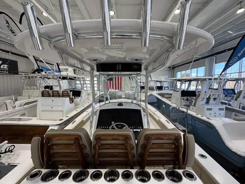 Slide: The Image of 2025 Valhalla Boatworks V-29 in showroom, featuring sleek design and modern amenities. - 10