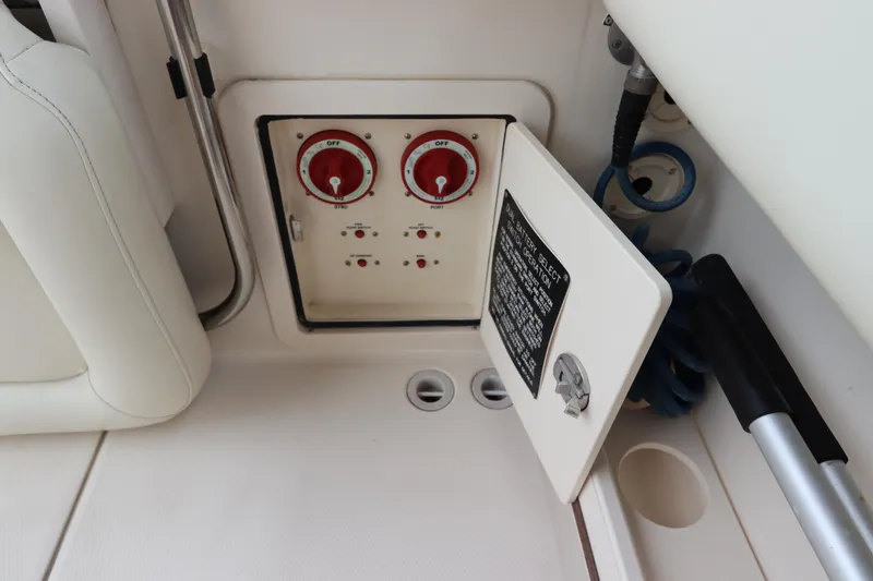 Slide: The Image of Control panel on a 2015 Grady-White Canyon 306 boat interior. - 10