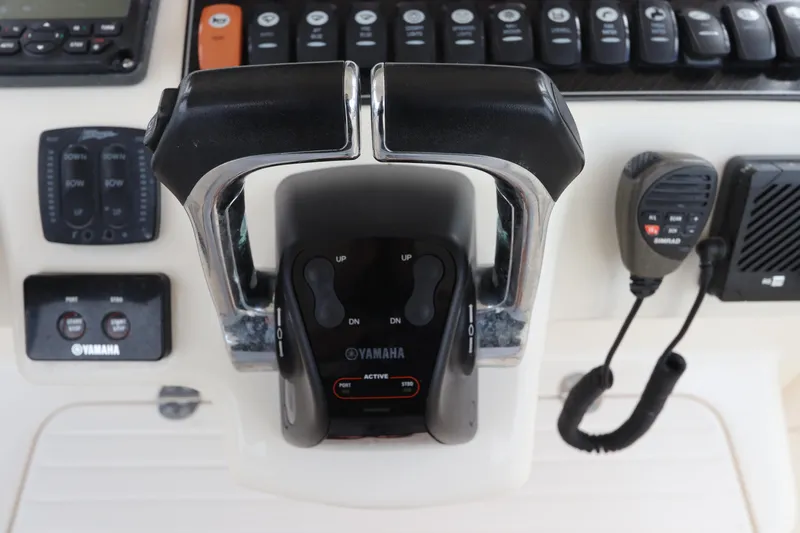 Slide: The Image of Close-up of Yamaha throttle controls on 2015 Grady-White Canyon 306 boat. - 24