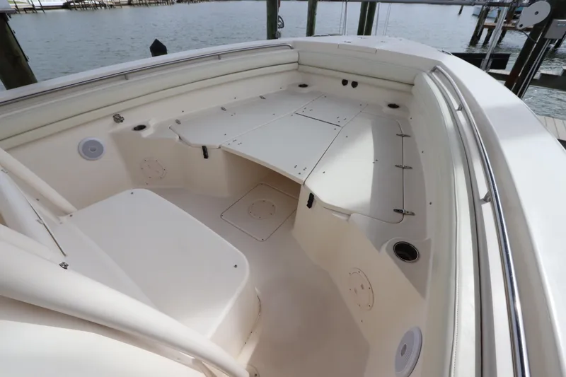 Slide: The Image of 2015 Grady-White Canyon 306 boat interior with spacious seating and storage. - 25