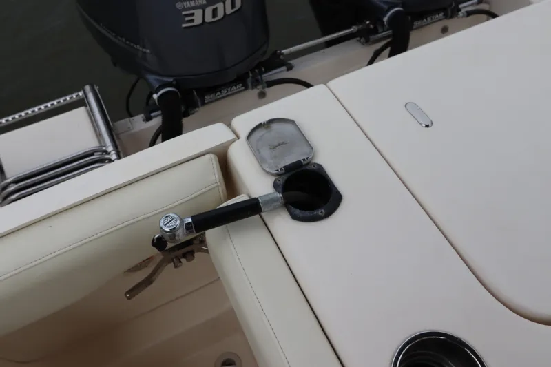 Slide: The Image of 2015 Grady-White Canyon 306 boat deck with rod holder and Yamaha 300 engine. - 7