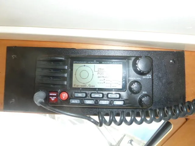 Slide: The Image of VHF marine radio on 2006 Sabre 38 Express boat dashboard. - 17