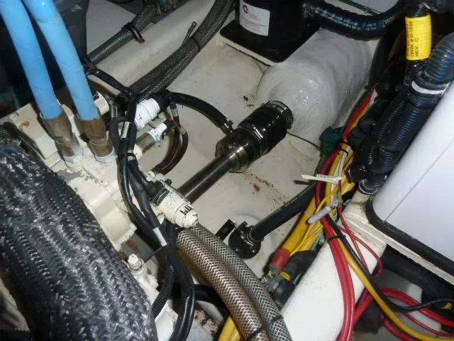 Slide: The Image of Engine compartment of 2006 Sabre 38 Express with visible wiring and hoses. - 29