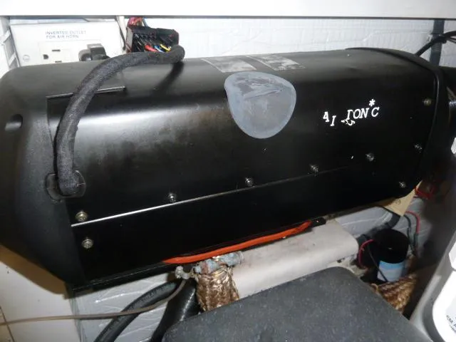 Slide: The Image of Engine compartment of 2006 Sabre 38 Express boat, showing mechanical components. - 34