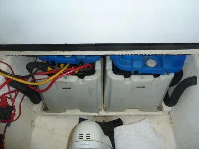 Slide: The Image of Battery compartment of a 2006 Sabre 38 Express boat with wiring and ventilation. - 35
