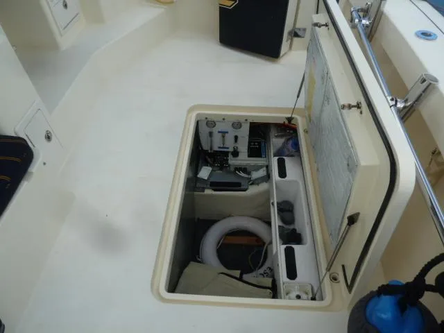 Slide: The Image of 2006 Sabre 38 Express boat storage compartment with equipment and accessories. - 37